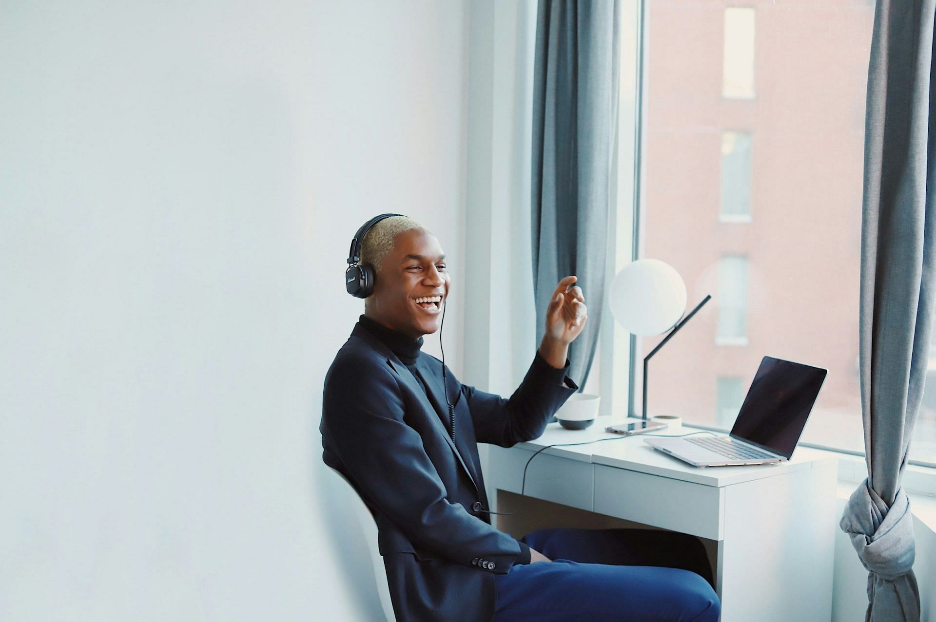 Desk Exercises (Image via Unsplash/Good Faces)
